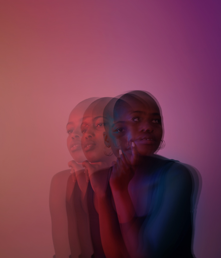 Blurred image of woman contemplating